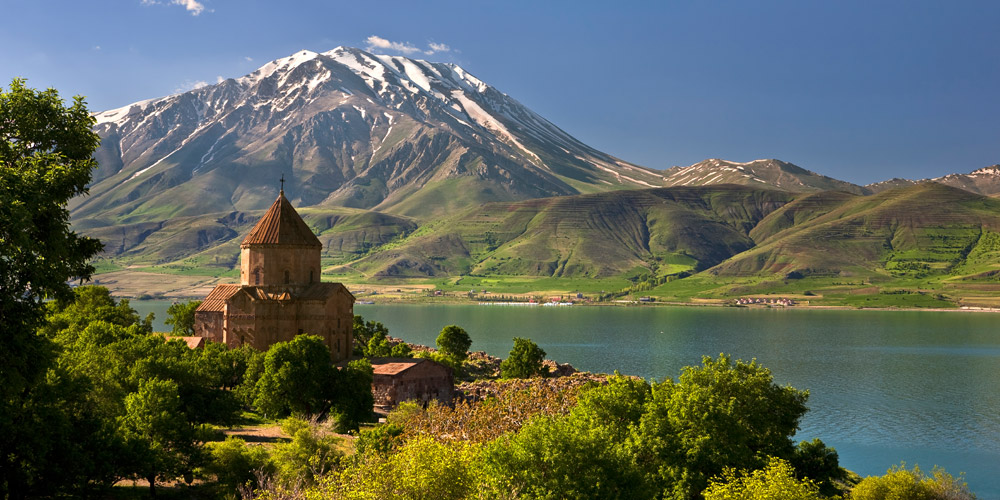 Van lake, with a view of Akhtamar Armenian church and Artos mountain in the back