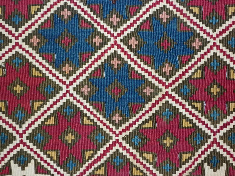 A kilim from Adıyaman, South Eastern Turkey,, with cochineal red, mid-19th century