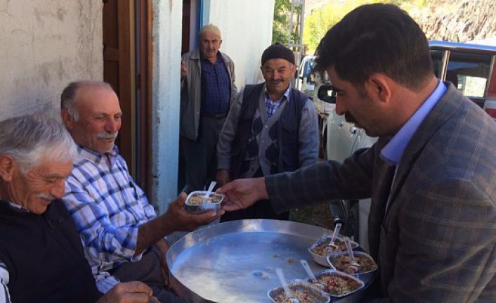 Serving a special pudding for the abundance in the village