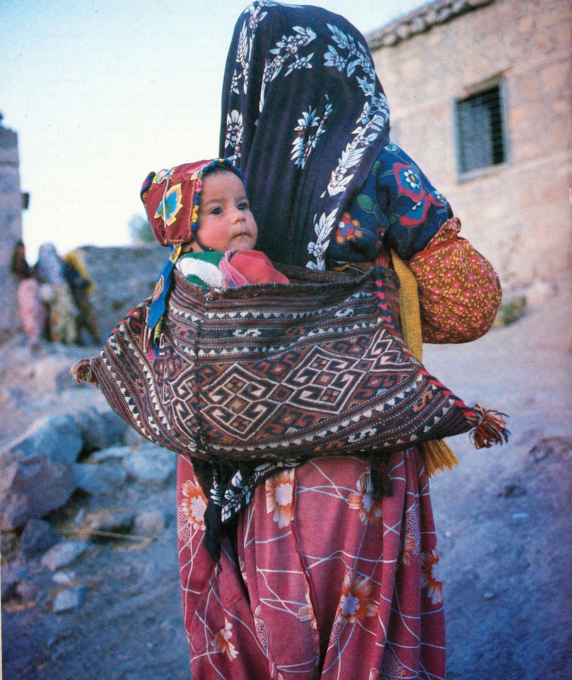 The nomadic way of carrying babies, Shavak tribeswoman Tunceli, Eastern Turkey, 1988