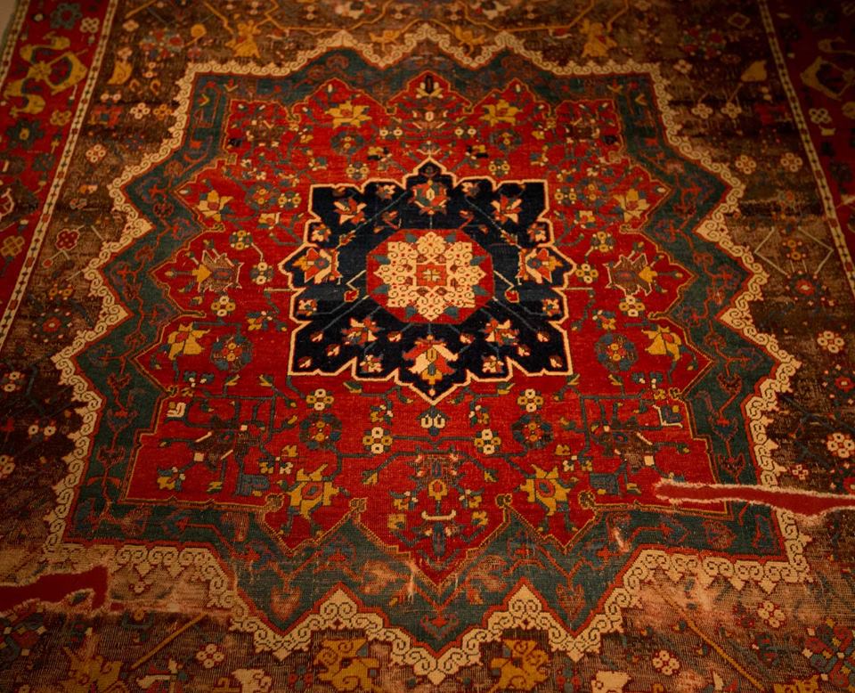 15th century Eastern Anatolian workshop carpet with very fine structure and floral and cloudband patterns with Persian Effect. Vakiflar Museum