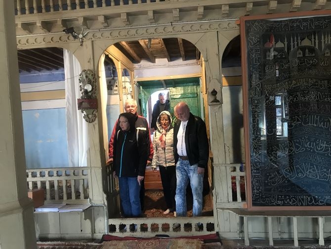Tourists inside the village mosque, Antalya, South Western Turkey